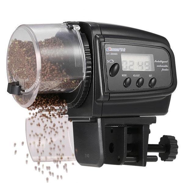 Digital Automatic Aquarium Fish Feeder dispensing fish food with electronic timer for precise feeding.