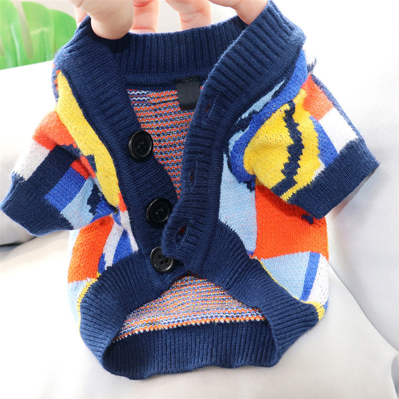 Schnauzer dog clothes featuring a colorful, cozy knit cardigan with buttons for small and medium-sized dogs.
