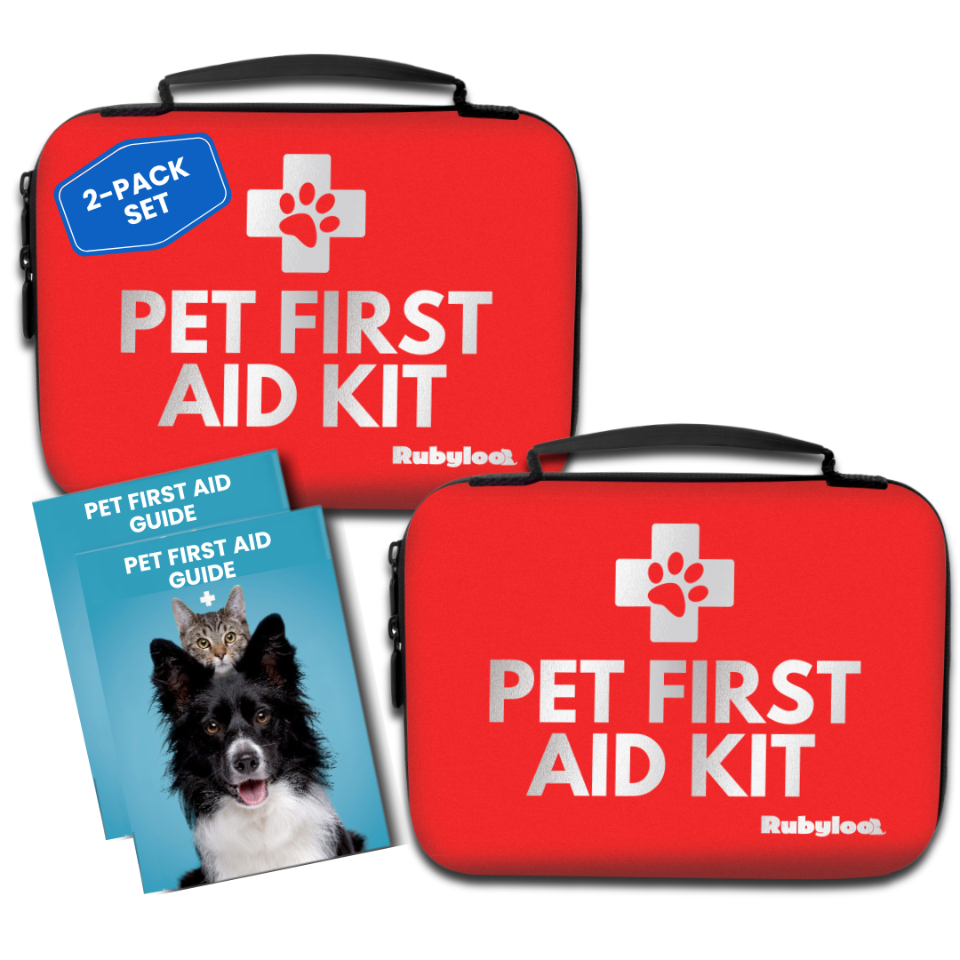Two red pet first aid kits with a guide on a white background