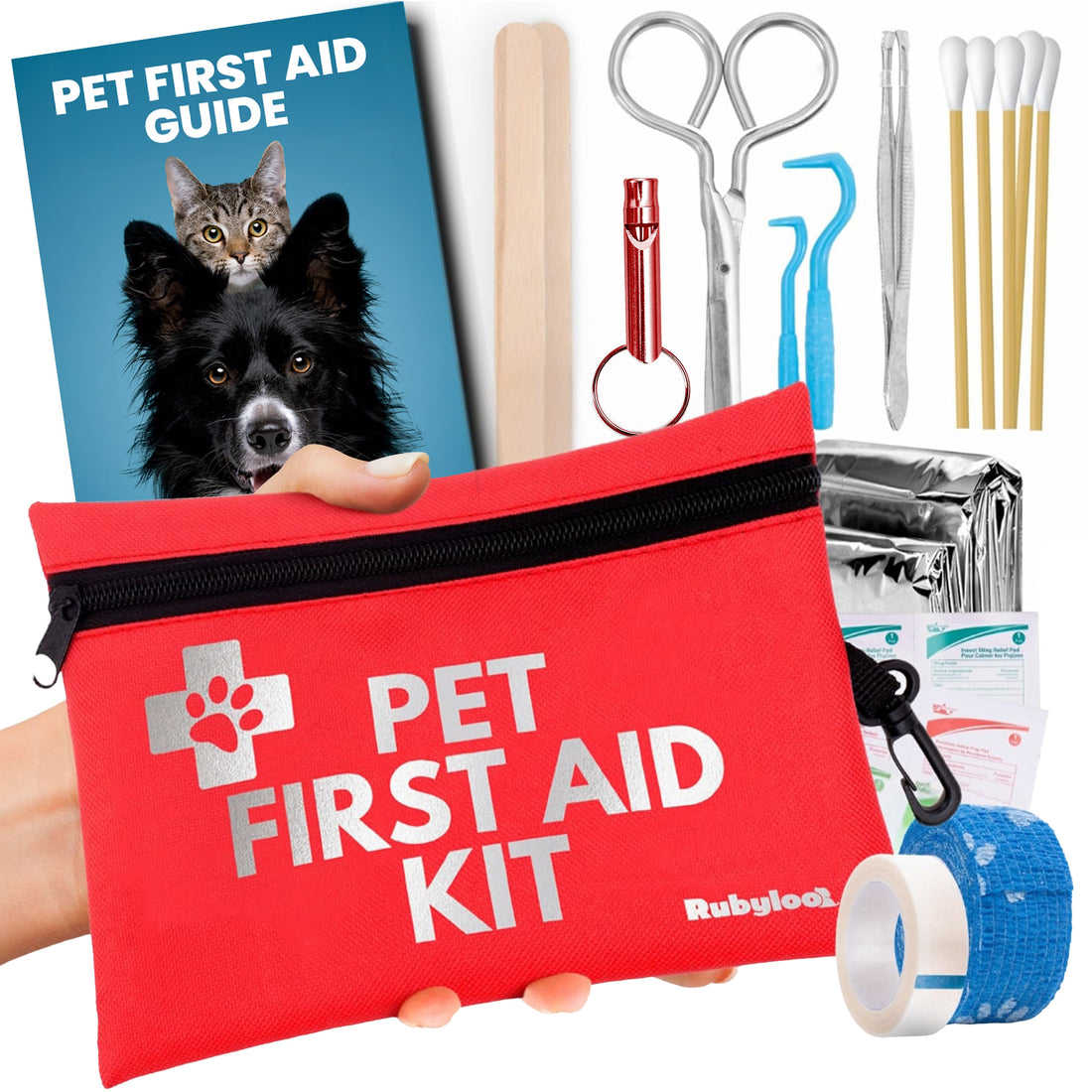 Pet first aid kit with red pouch, tools, and guide on a white background
