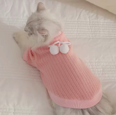 autumn winter pet sweater - pink knitted sweater on a cozy cat, perfect for chilly weather.